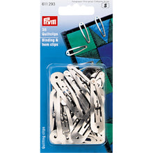 將圖片載入圖庫檢視器 Binding & hem clips Default Title